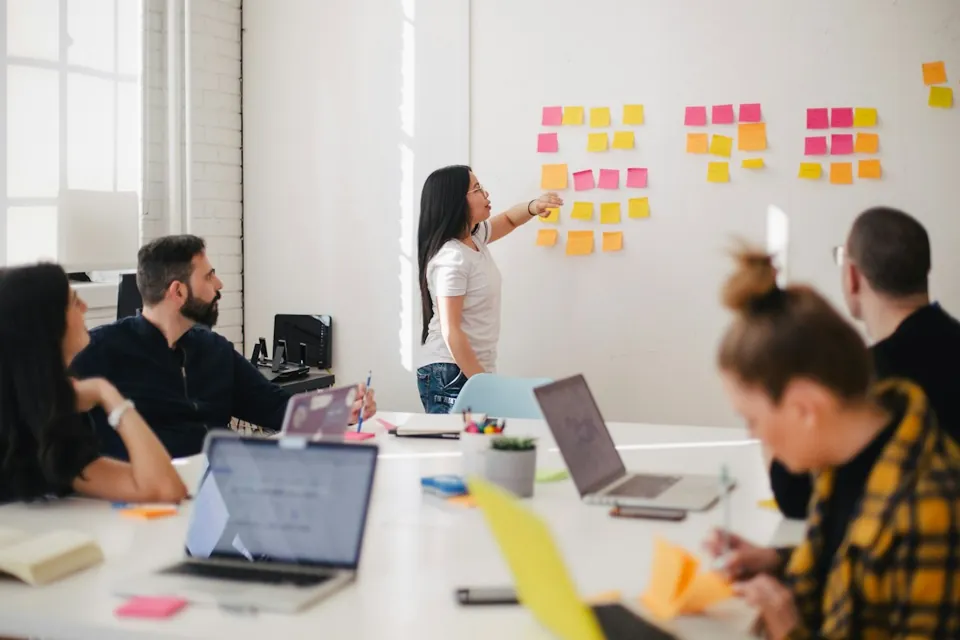 A team mapping the stages of a business workflow