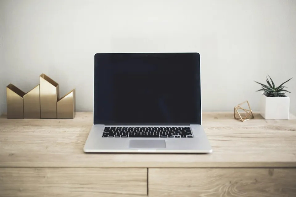 Business laptop illustrating the equipment specification for a procurement enquiry